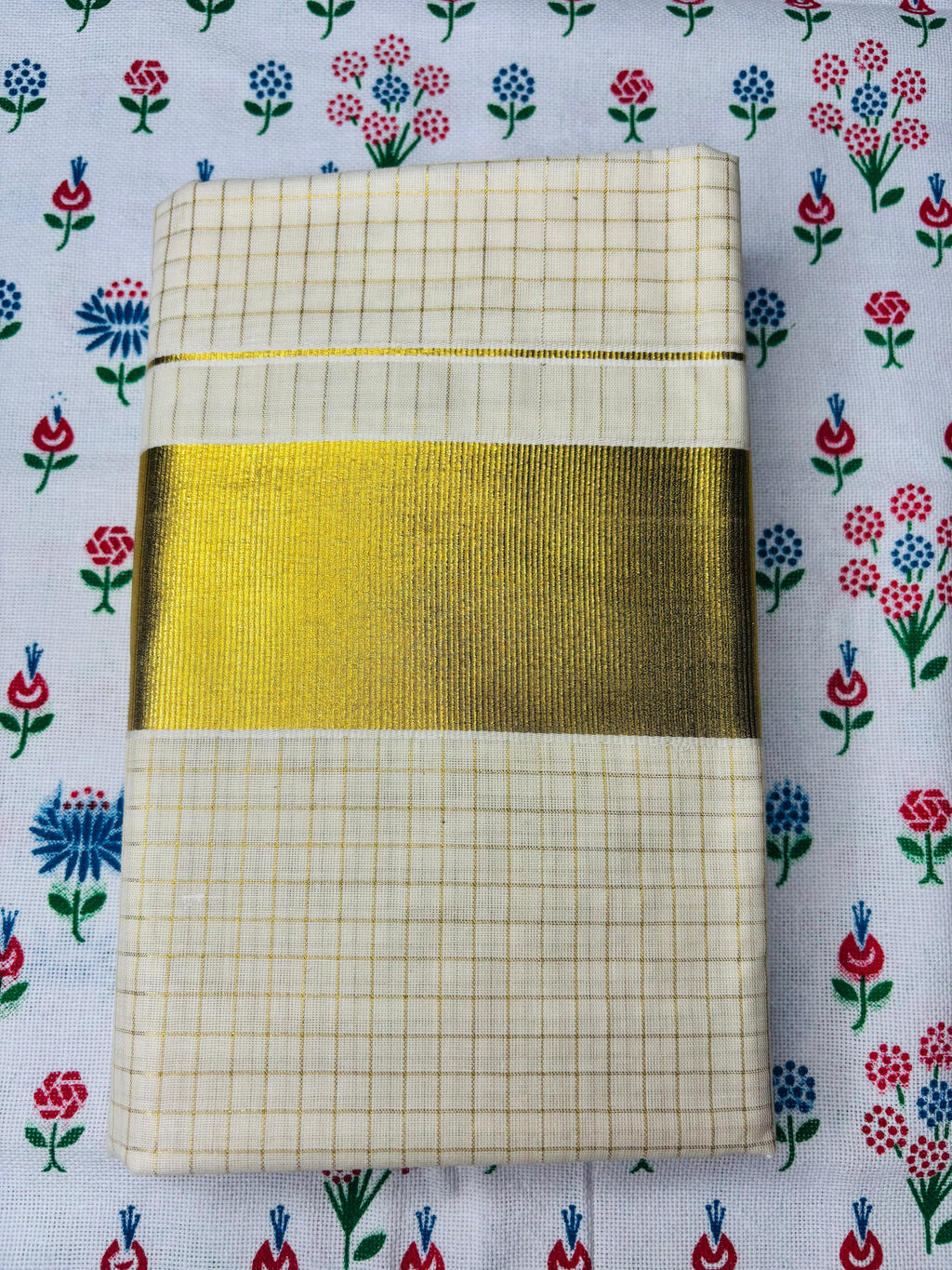 MAT002 Elevate your traditional look with our Cotton Set Mundu featuring small checked designs