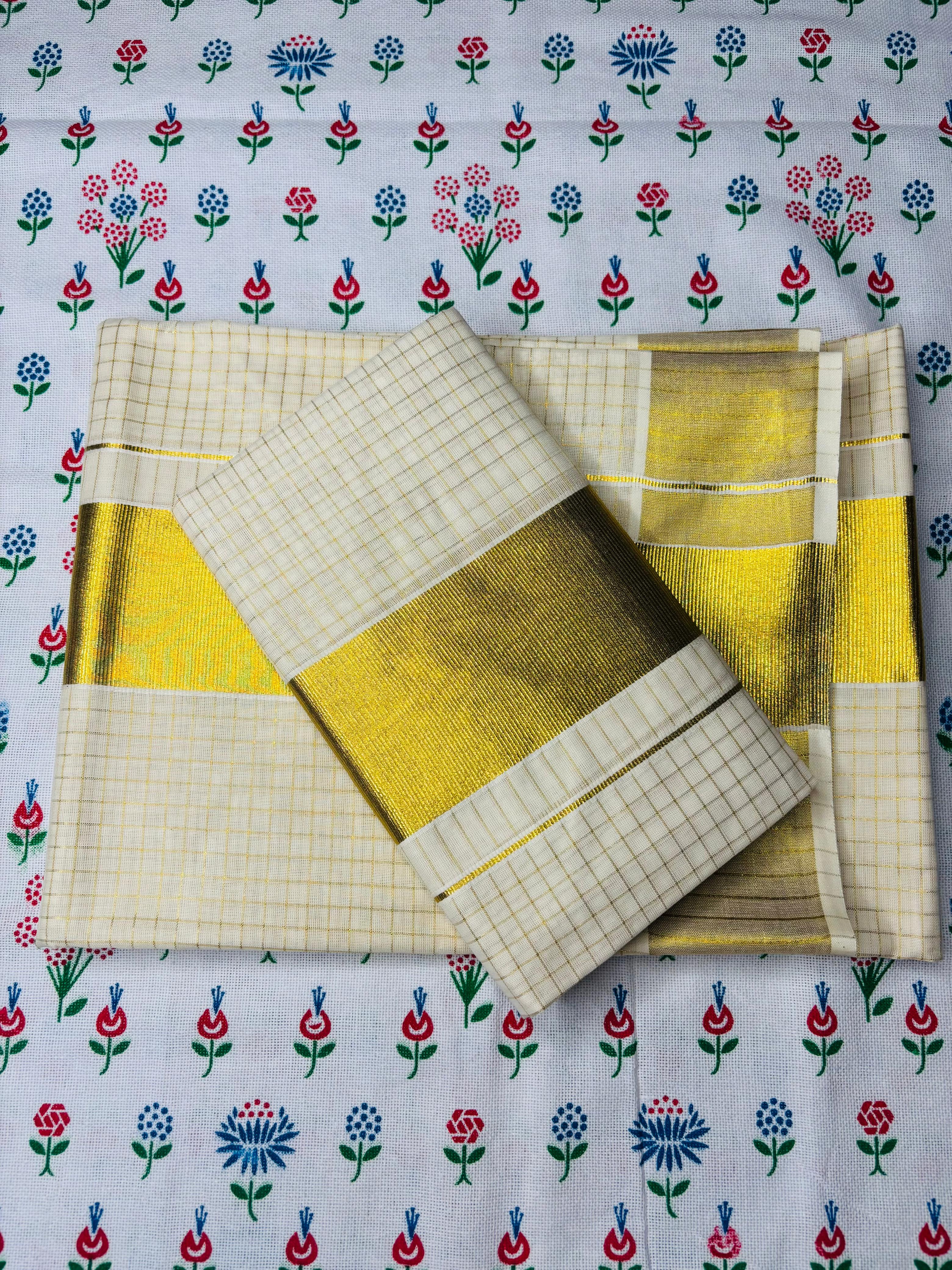 MAT002 Elevate your traditional look with our Cotton Set Mundu featuring small checked designs