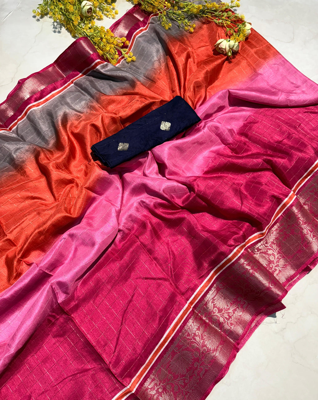 PRD004 Step out in style with our super dola chex saree featuring a dual blouse design