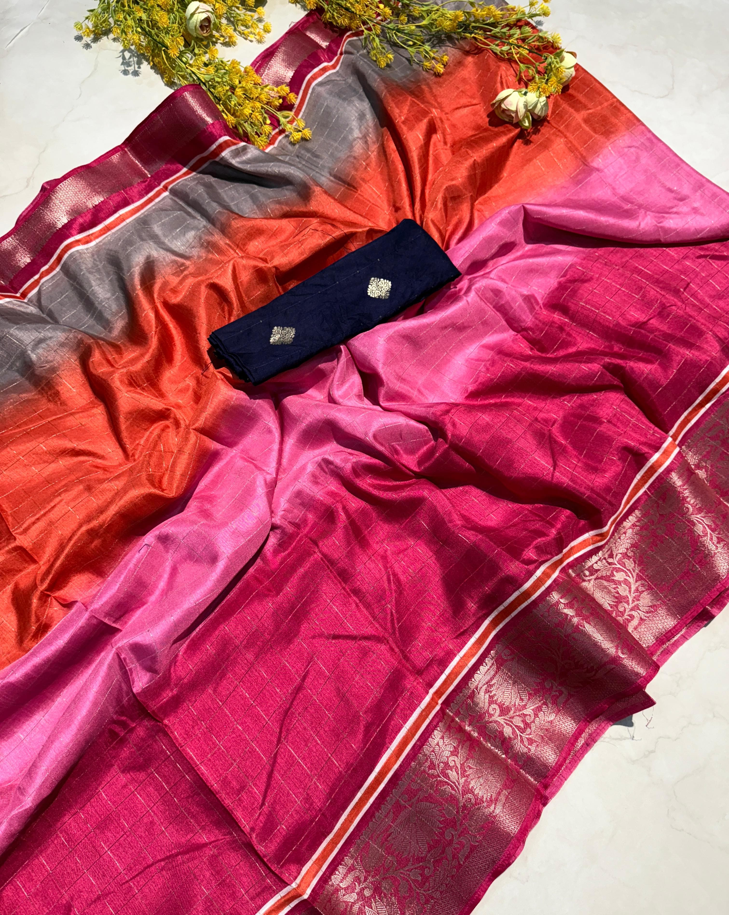 PRD004 Step out in style with our super dola chex saree featuring a dual blouse design