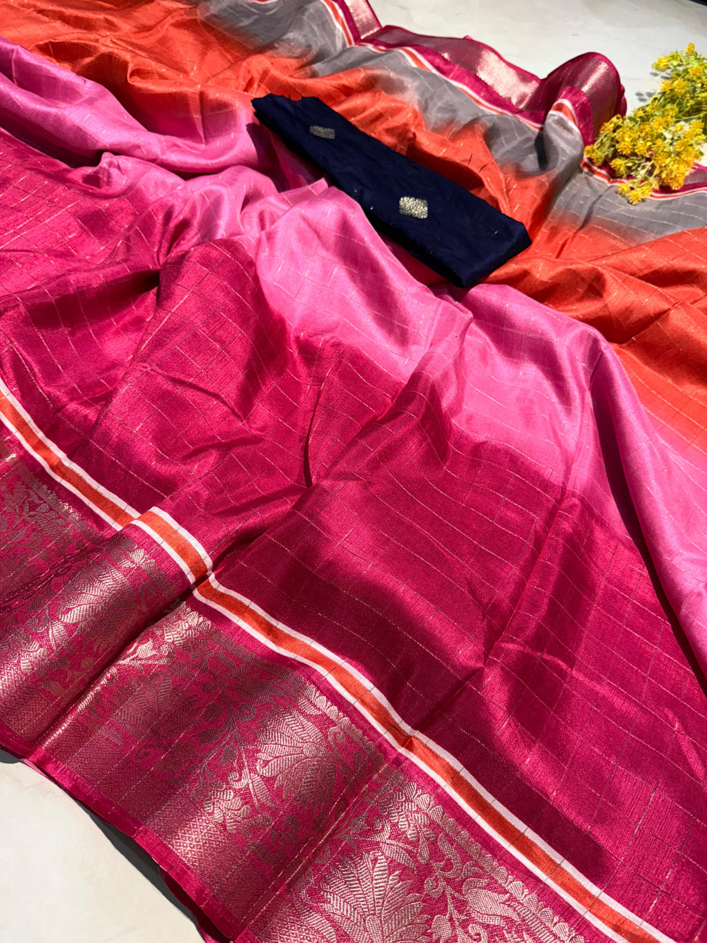 PRD004 Step out in style with our super dola chex saree featuring a dual blouse design