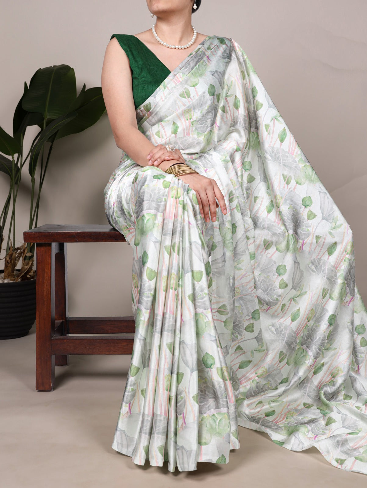 PRD0034 Step into a garden of glamour with this stunning satin floral printed saree.