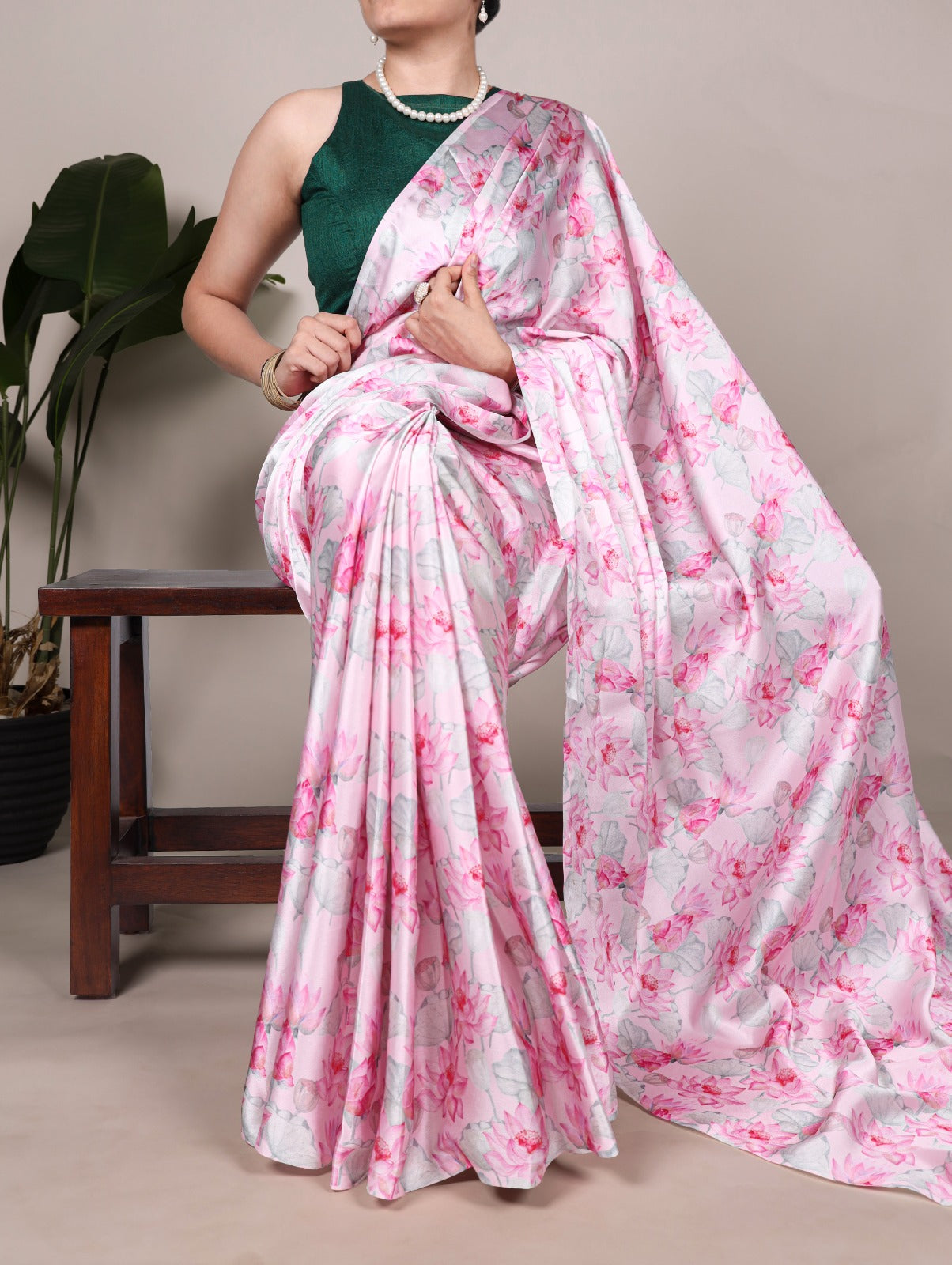 PRD0034 Step into a garden of glamour with this stunning satin floral printed saree.