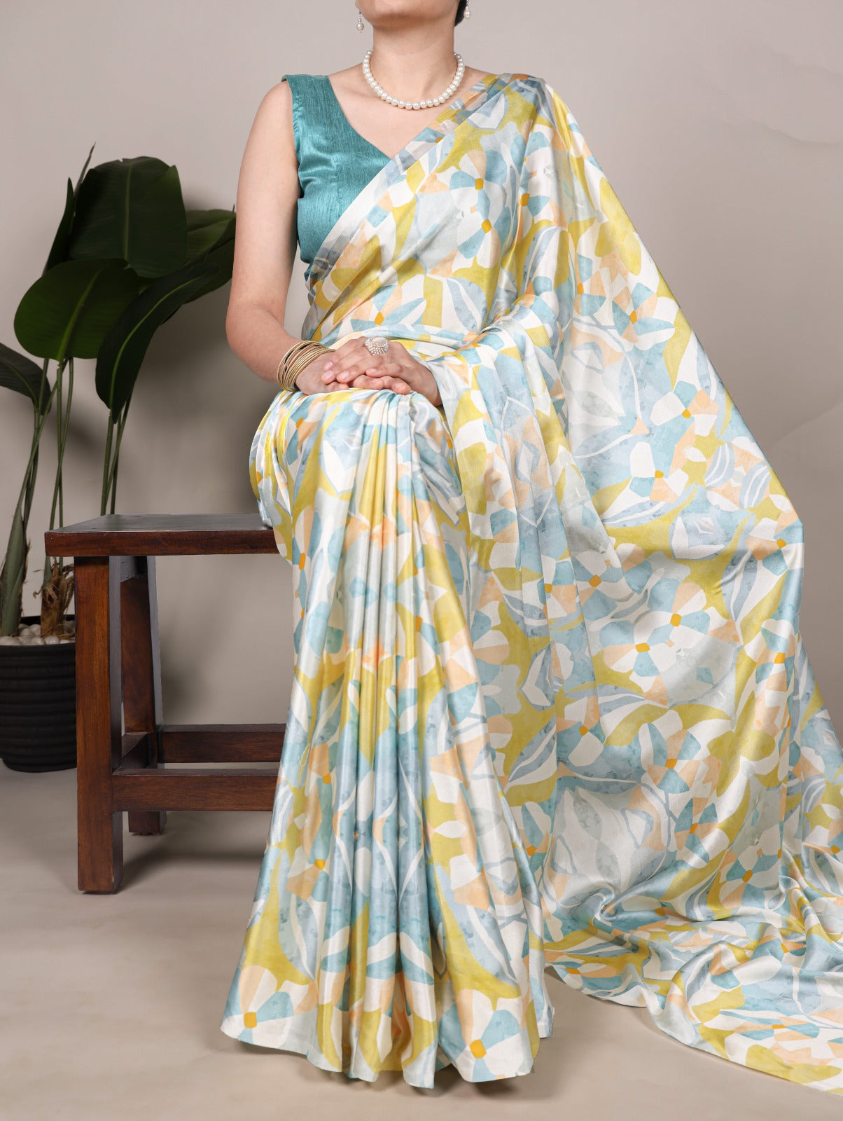 PRD0034 Step into a garden of glamour with this stunning satin floral printed saree.