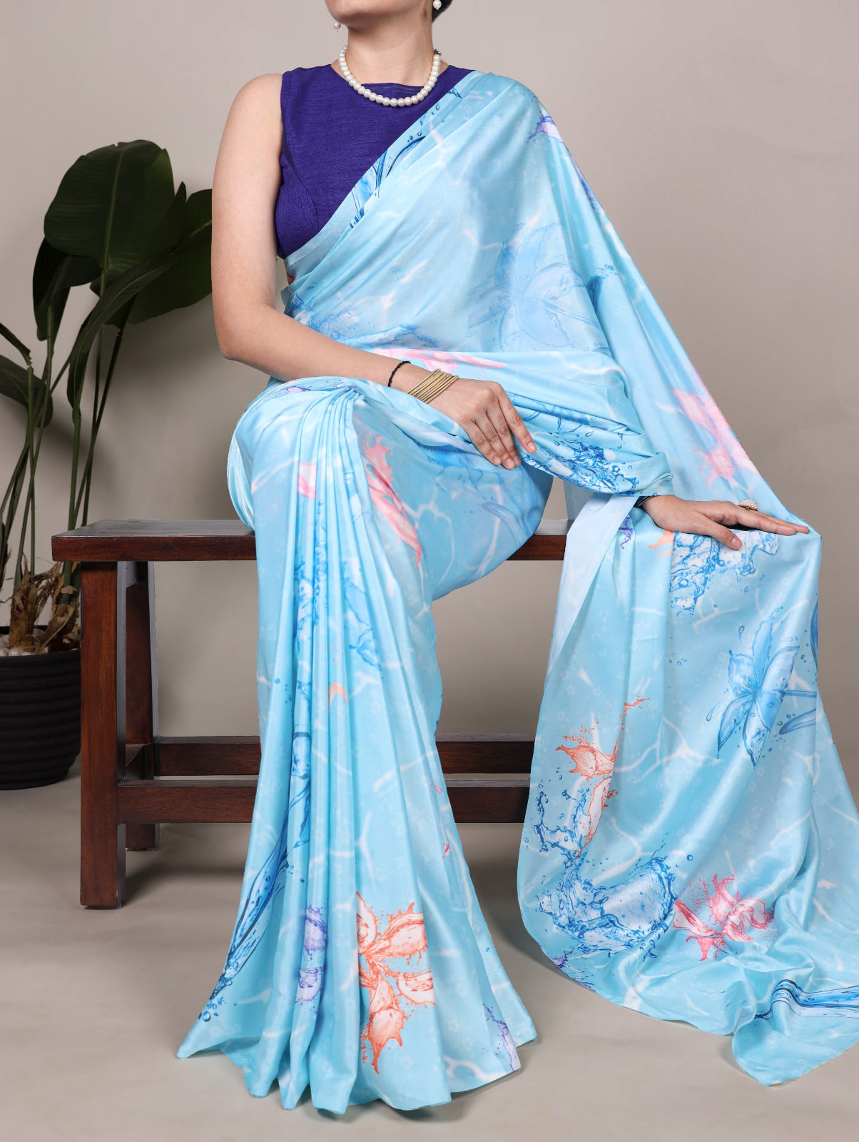PRD0034 Step into a garden of glamour with this stunning satin floral printed saree.