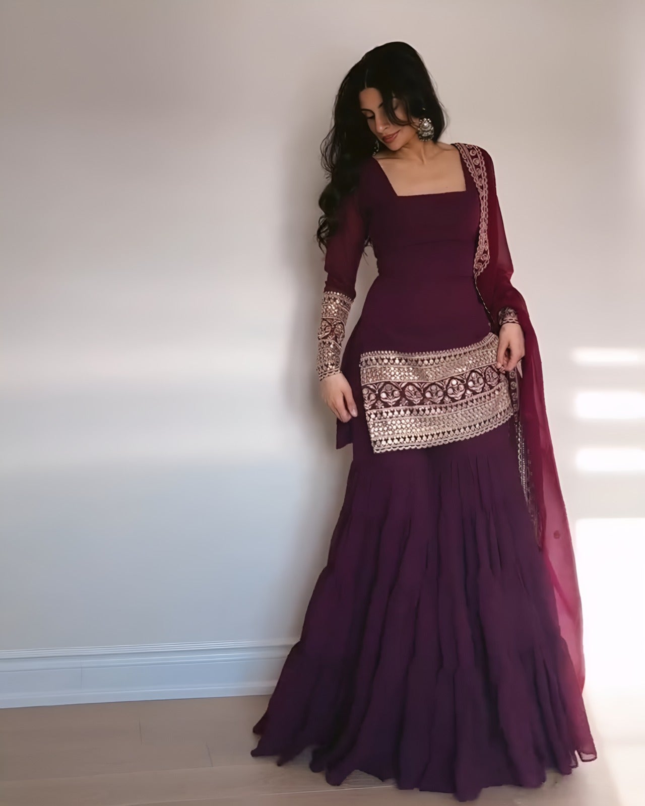 PRD00107 Dazzle in this designer 3-layer ruffle sharara set crafted in soft georgette