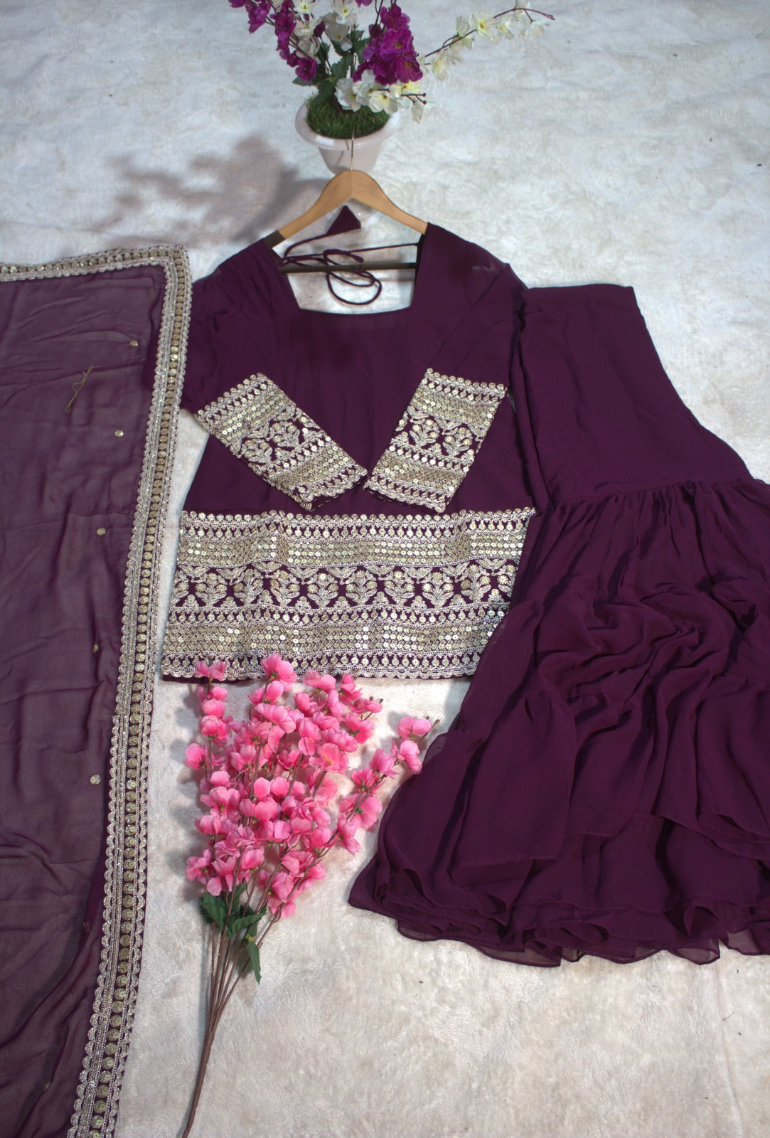 PRD00107 Dazzle in this designer 3-layer ruffle sharara set crafted in soft georgette