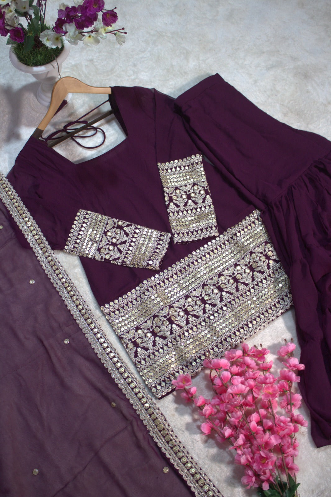 PRD00107 Dazzle in this designer 3-layer ruffle sharara set crafted in soft georgette