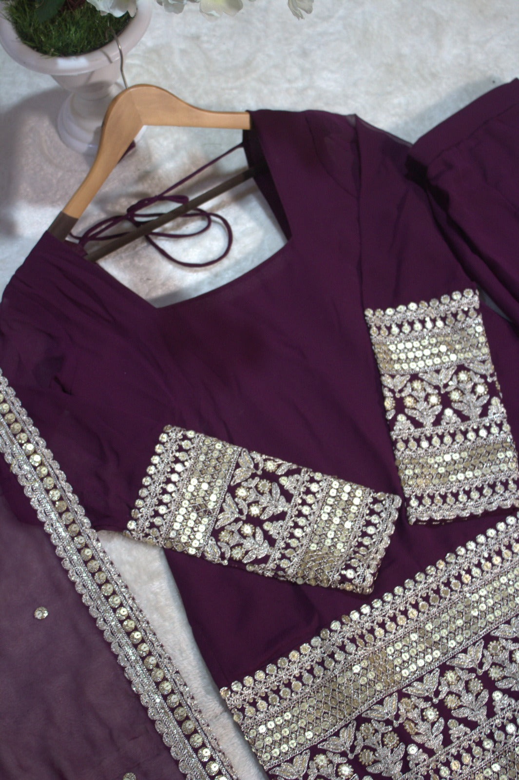 PRD00107 Dazzle in this designer 3-layer ruffle sharara set crafted in soft georgette