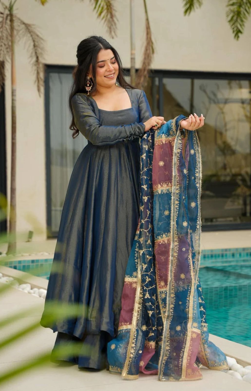 PRD00109 stunning carousing color paired with a beautifully embroidered multi-tone dupatta