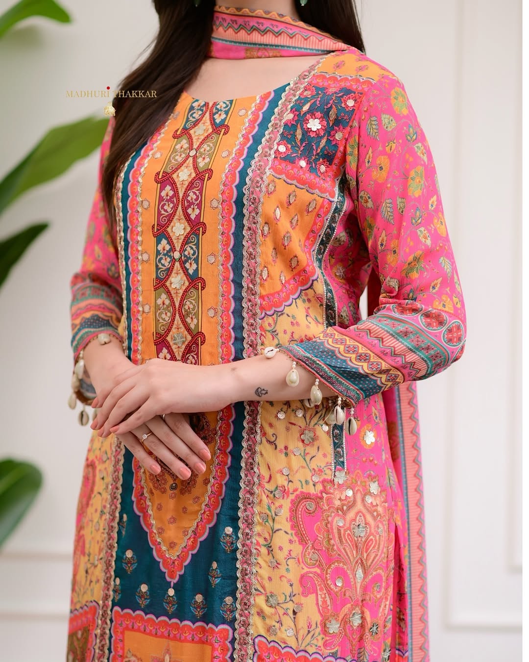 PRD00114 Beautifully crafted Pure Chinnon Suits in beautiful colors, which are decorated with the finest Gota & Cowry