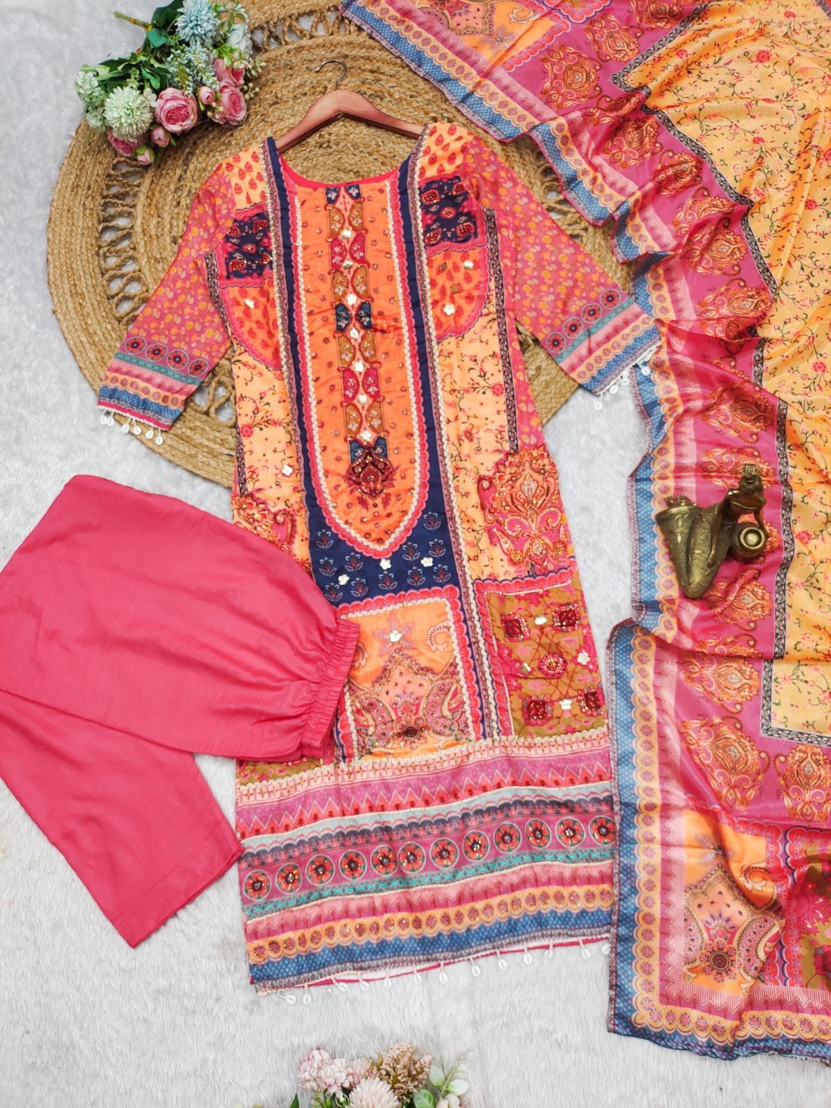 PRD00114 Beautifully crafted Pure Chinnon Suits in beautiful colors, which are decorated with the finest Gota & Cowry