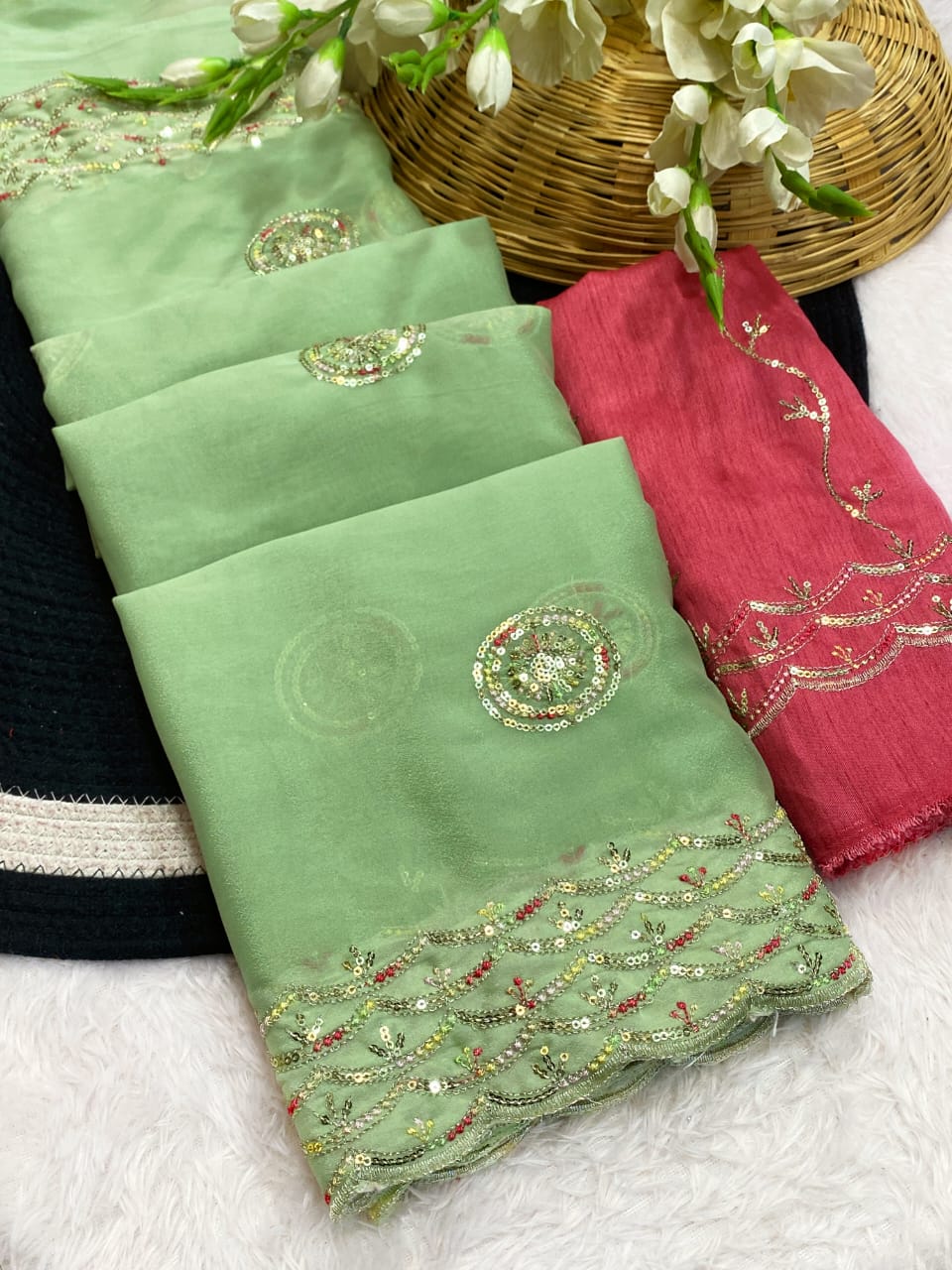 PRD00124 RICH AND ELEGENT PREMIUM GEORGETTE SARI WITH SEQUINS WORK ON BORDER